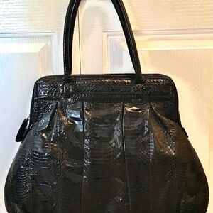 Stunning Angel Jackson large snake skin bag.